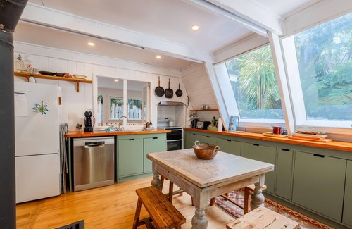 Ostend Cottage | Enchanted Valley - Enchanted Valley is a gorgeous cottage plus cabana in the heart of Waiheke Island. Located in a peaceful valley section, the sound of the birds is your constant companion. With two bedrooms and four beds, this is perfect for up to
