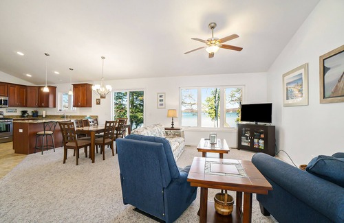 Empire House | Enchanting lakefront home with firepit, patio, grill & washer/dryer