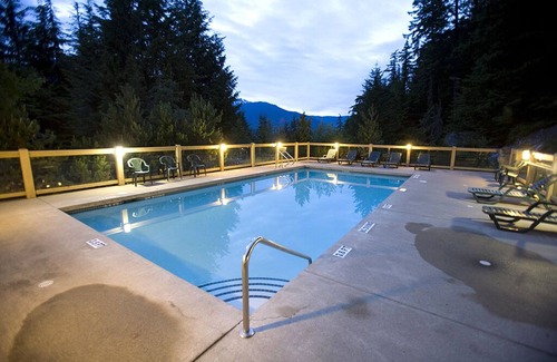 Nordic Estates Condo | Enchanting mountainside Ski In/Out french lodge style home pool hot tub