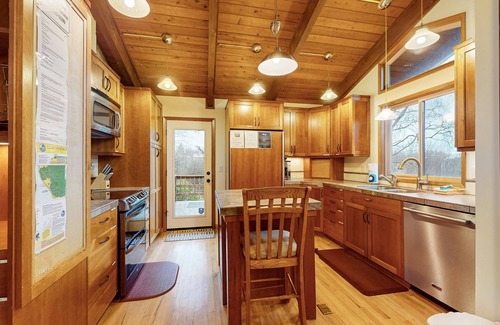 Bay City House | Enchanting retreat near beach with private hot tub, sauna, firepit, dog-friendly