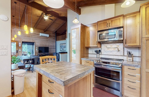 Bay City House | Enchanting retreat near beach with private hot tub, sauna, firepit, dog-friendly