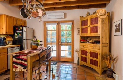 Historic Eastside House | Enchanting, romantic art-filled adobe, lush private gardens, short walk to Plaza