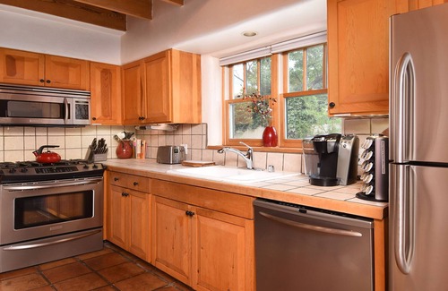 Historic Eastside House | Enchanting, romantic art-filled adobe, lush private gardens, short walk to Plaza