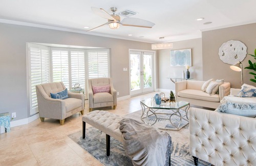 Garden Isles House | Enchanting waterfront home with pool, hot tub, playground, fast WiFi, & W/D