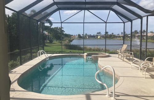 Biggar House | Endless Summer, Gorgeous Sunsets! Spacious Lakefront 4/3 with pool and spa!