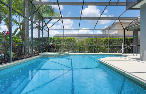 Calabay Parc Villa | Endless Summer Villa, Spacious 4 bedroom pool home w/spa and tropical garden and themed kids rooms