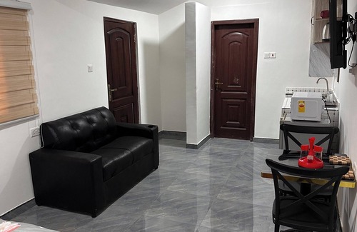 Accra Cabin | Enjoy a comfortable room with all the essentials for a great stay.