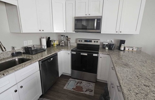 Harrisburg Condo | Enjoy a convenient 3BR House near —Charlotte Motor Speedway & Uptown Charlotte.