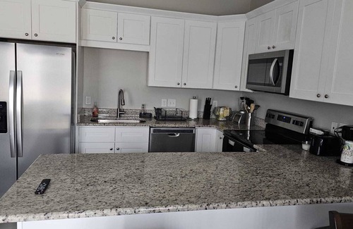 Harrisburg Condo | Enjoy a convenient 3BR House near —Charlotte Motor Speedway & Uptown Charlotte.