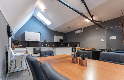 Oss House | Enjoy a stylish stay in our 12-bedroom property each with a private shower and fridge