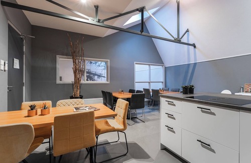 Oss House | Enjoy a stylish stay in our 12-bedroom property each with a private shower and fridge
