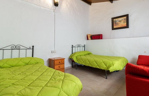 Cuevas de San Marcos House | Enjoy a unique view of the countryside in this inviting vacation home with pool.