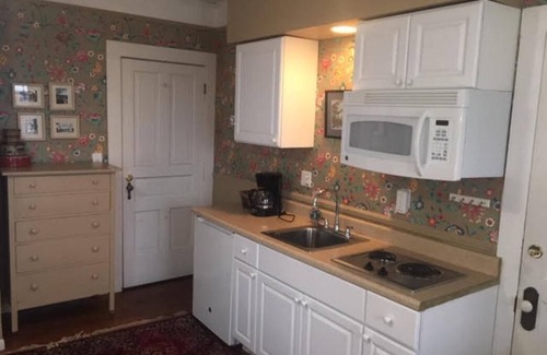 Frankfort House | Enjoy a view of Betsie Bay from your studio suite a block from Lake Michigan