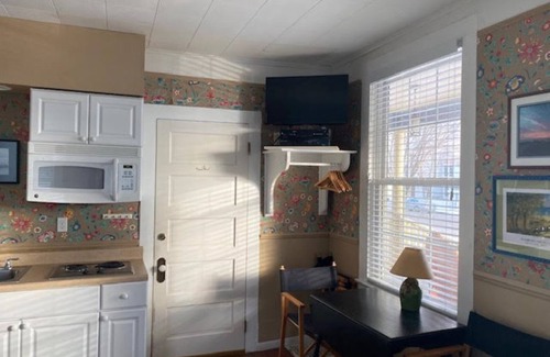 Frankfort House | Enjoy a view of Betsie Bay from your studio suite a block from Lake Michigan