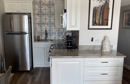 North Topsail Beach Condo | Enjoy an oceanfront getaway with beautiful beach steps from your door.