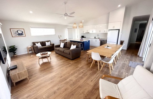 North Beach House | Enjoy beach views in complete comfort.