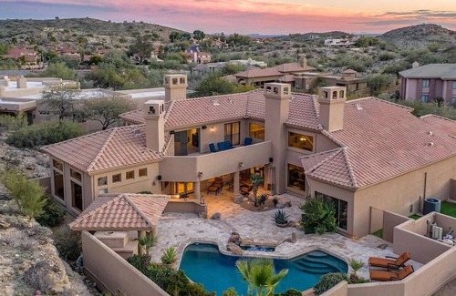 Mountain Park Ranch House | Enjoy breathtaking views of the mountainside throughout this hillside estate.