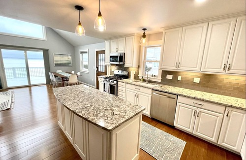 Beulah House | Enjoy Crystal Lake's pristine water and amazing sunsets from this lakefront home