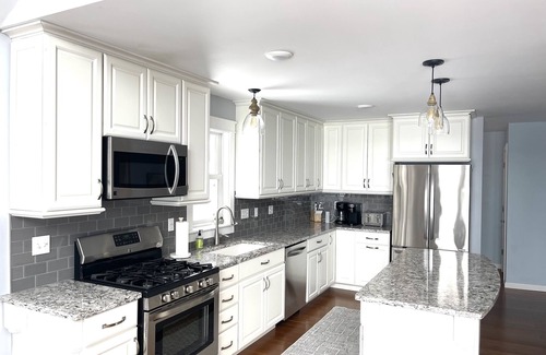 Beulah House | Enjoy Crystal Lake's pristine water and amazing sunsets from this lakefront home