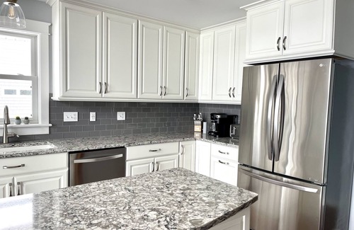 Beulah House | Enjoy Crystal Lake's pristine water and amazing sunsets from this lakefront home