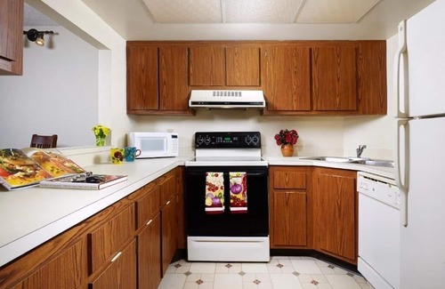 Moorings Hotel | Enjoy Garden Views in a Clean, Spacious Room at Naple