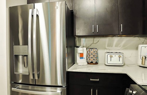 Midtown Apartment | Enjoy luxury and comfort in our stylish 1-bedroom,