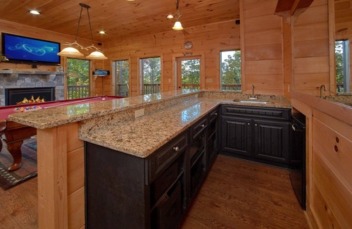 Gatlinburg - Pigeon Forge Cabin | Enjoy mountains views, hot tub, firepit and a private theater experience!