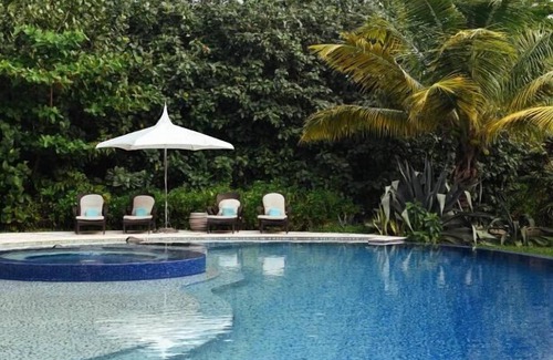 San Pedro Apartment | Enjoy North Ambergris Caye Beach! 2 Spacious Units w/Kitchen, Pool, Parking!