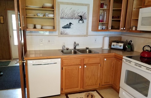 Williamsburg Cottage | Enjoy our Skegemog Lakefront Cottage/w dock & Boat Hoist on Elk-Torch Chain
