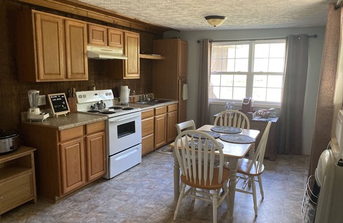 Gordo Cabin | Enjoy our stocked lake and 28 miles to The University of Alabama for football!