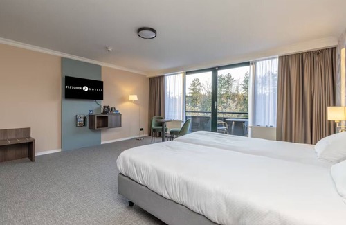 Exloo House | Enjoy Scenic Cycling Trails & Tennis, Plus Indoor Pool Access and Free Parking