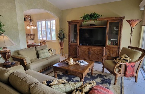 Fort Myers Condo | Enjoy spectacular sunsets in this upper coach house with a West Indies flair.