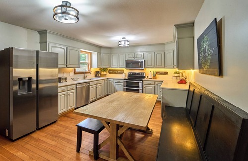 Gatlinburg - Pigeon Forge Cabin | Enjoy the creek, fire pit, hot tub and swing set- sleeps 14 guests