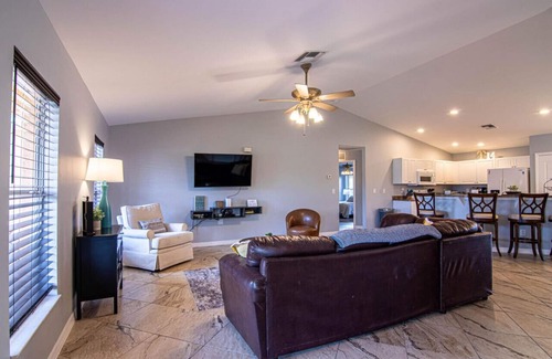 Diplomat House | Enjoy the Salt Life with this Heated Saltwater Pool and outdoor lanai.