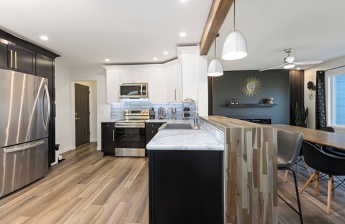 West End House | Enjoy the saltwater hot tub and gas fire pit in this 5 bedroom 2.5 bath house