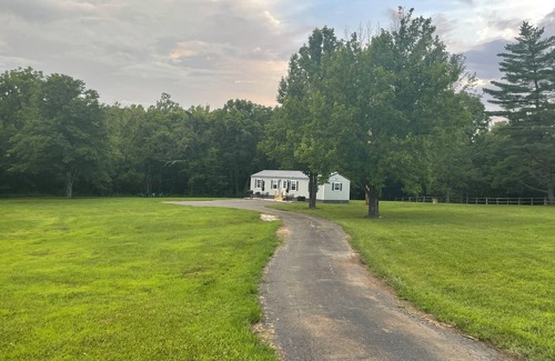 Black House | Enjoyable 2-bedroom house on 24 acres right on Black River.