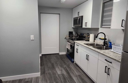 Saskatoon House | Entire 2 Bedrooms Basement Suite. Close to Airport and Parks