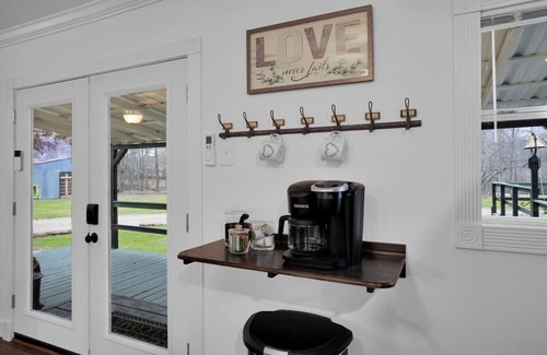 Montgomery Cottage | Entire Cottage Getaway | Pond Fire Pit Deck