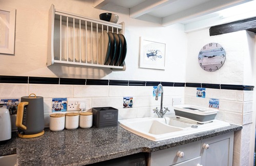 Mevagissey Apartment | Entire Harbourside Lodge and Courtyard, just a few feet from Mevagissey Harbour