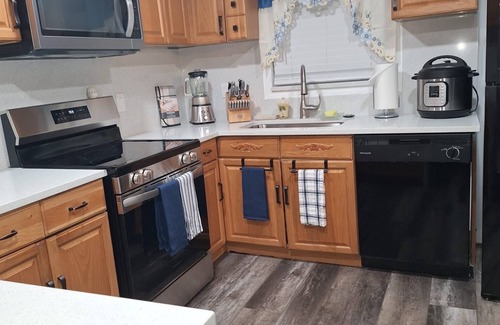 West Lealman House | Entire Home 3BR 1BA in St. Pete, FL - Sleeps 6 Spacious Private Backyard