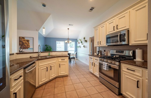 Manvel House | Entire Modern 3br house with glass fireplace and patio.