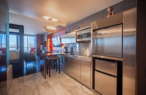 Las Vegas Hotel | Entire Vegas King bed, balcony suite. Marble bath spa tub, 70"/55" smart TVs