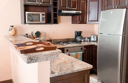 Tamarindo Villa | Entire villa in gated community, 2 Bd, 2 & 1/2 bath, pool, sandy beach.
