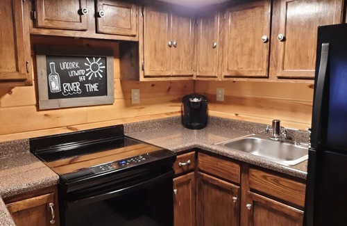 Mammoth Spring Cabin | EntirelyRested Spring River Cabin near Saddler Falls