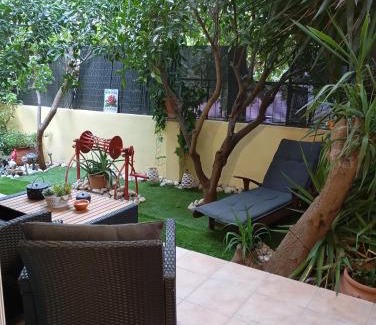 Irakleio Apartment | Ηome & Garden with parking close to Olympic Stadium