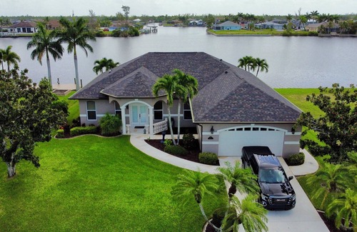 Burnt Store House | EPIC VIEWS! HUGE DOCK! Direct Salt Water Access - Water Front & Peaceful