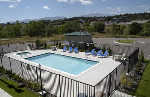 Northwest Colorado Springs Condo | Equipped Suite with Mountain View | Outdoor Pool Access, Housekeeping + Business Center