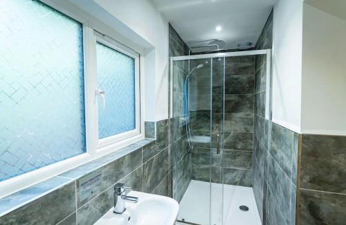 Farley House | Errwood, woodland lodge with hot tubs for 14