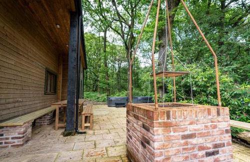 Farley House | Errwood, woodland lodge with hot tubs for 14