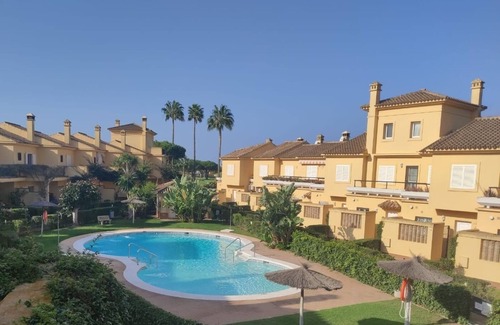 Chiclana de la Frontera House | Townhouse in Novo Sancti Petri, close to the beach and golf courses.